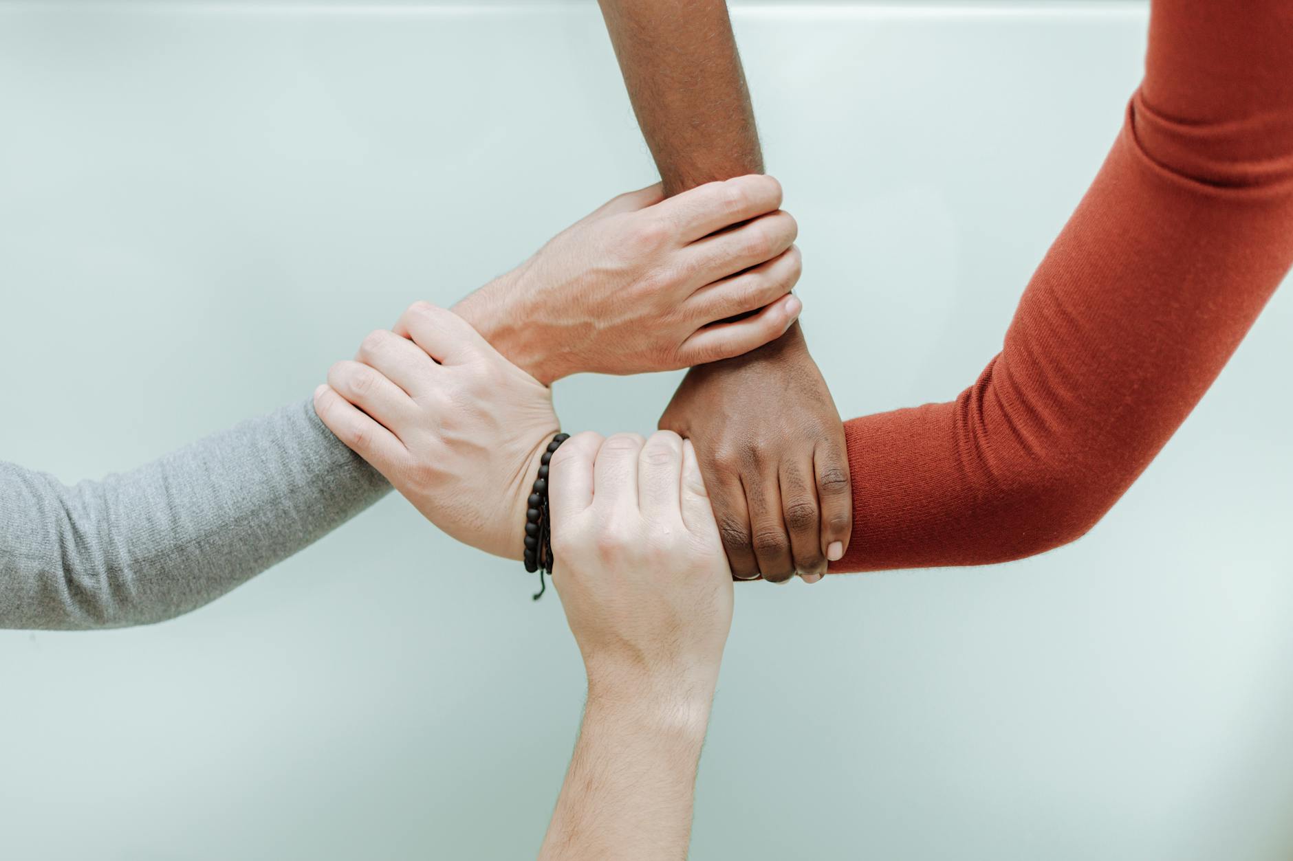 close up of hands holds together